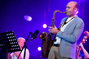 Sax player Sergei Golovnya performs live during Valery Ponomaryov's Messengers from Russia program at the Koktebel Jazz Party 2017 festival.