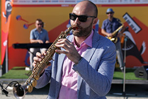 Saxophonist Sergei Golovnya performs at the 16th Koktebel Jazz Party international music festival