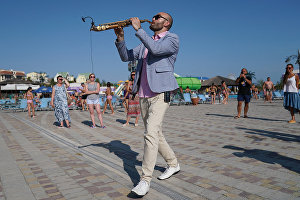 Saxophonist Sergei Golovnya performs at the 16th Koktebel Jazz Party international music festival