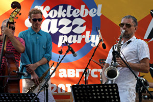 Saxophonist German Lukyanov, right, performs on the Voloshinskaya Stage at the 16th Koktebel Jazz Party international music festival